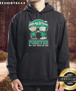 Alt Text: Cute Snoopy and Charlie Brown in New York Jets hoodie, showcasing team spirit with 'Forever, Not Just When We Win' slogan.