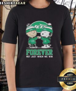 Alt Text: Cute Peanut Snoopy and Charlie Brown graphic on a New York Jets ladies tee, perfect for fans who love to celebrate!