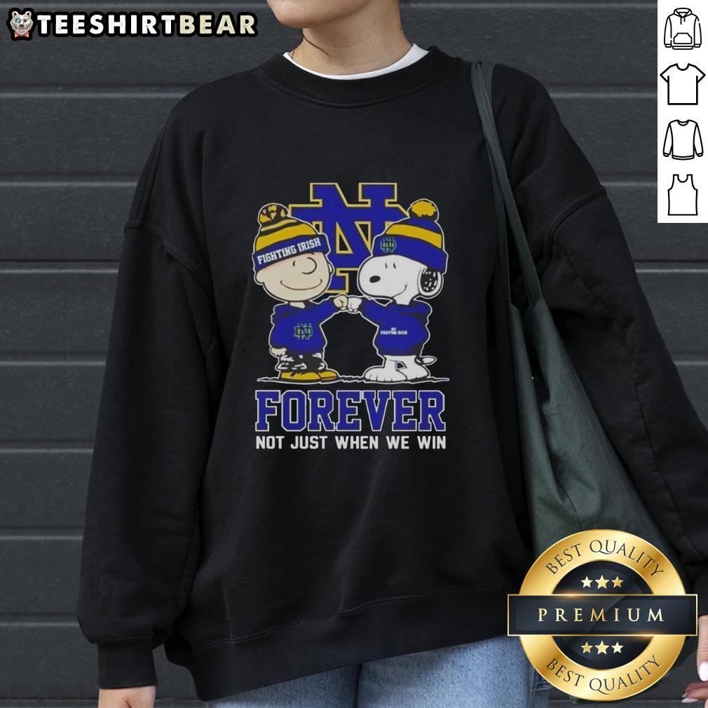 cute-peanut-snoopy-charlie-brown-notre-dame-fighting-irish-forever-not-just-when-we-win-sweatshirt Alt Text: Cute Peanut Snoopy and Charlie Brown sweatshirt featuring Notre Dame Fighting Irish Forever design. Perfect for fans!