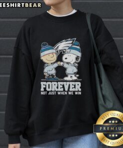Alt Text: Cute Peanut Snoopy and Charlie Brown in a Philadelphia Eagles sweatshirt, celebrating loyalty with Forever, Not Just When We Win.