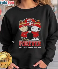 Cute Snoopy and Charlie Brown in a San Francisco 49ers sweatshirt, celebrating fandom with Forever, Not Just When We Win slogan.