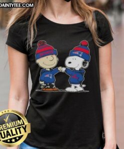 Alt Text: Cute Peanuts Charlie Brown and Snoopy fist bump in New England Patriots football tee for ladies.