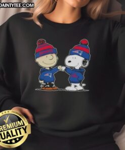 Alt Text: Cute Peanuts Charlie Brown fist bump with Snoopy in New England Patriots football sweatshirt design.