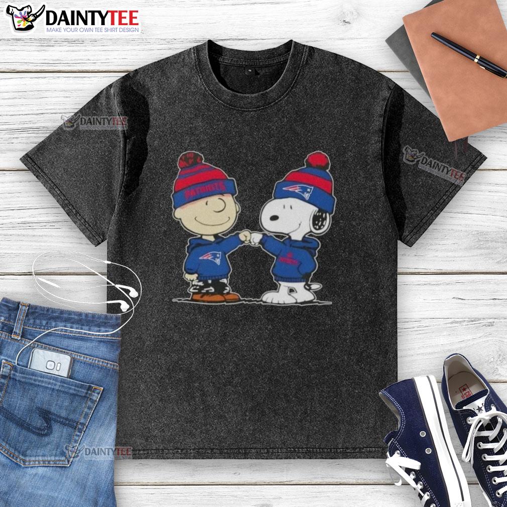 cute-peanuts-charlie-brown-fist-bump-snoopy-x-new-england-patriots-football-washed-t-shirt Alt Text: Cute Peanuts Charlie Brown and Snoopy fist bump on New England Patriots football washed t-shirt design.