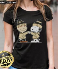 Alt Text: Cute Peanuts Charlie Brown and Snoopy fist bump in New Orleans Saints football ladies tee design.