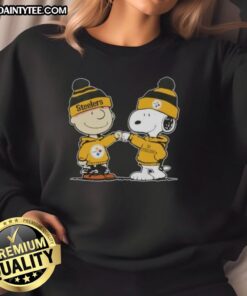 Alt Text: Cute Peanuts Charlie Brown and Snoopy fist bump in Pittsburgh Steelers football sweatshirt design.
