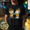 Alt Text: Cute Peanuts Charlie Brown and Snoopy fist bump in Pittsburgh Steelers football T-shirt, perfect for fans.