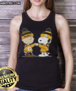 Cute Peanuts Charlie Brown fist bump with Snoopy, wearing Pittsburgh Steelers football tank top, perfect for fans.