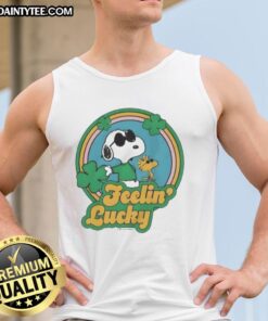 Cute Peanuts shamrock 'Feeling Lucky' tank top featuring Charlie Brown and friends in festive green design.