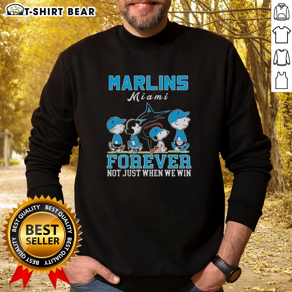 Cute Snoopy And Charlie Brown Miami Marlins Baseball Forever Not Just When We Win Sweatshirt Alt Text: Cute Snoopy and Charlie Brown sweatshirt celebrating Miami Marlins baseball, perfect for fans year-round.