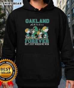 Cute Snoopy and Charlie Brown Oakland Athletics baseball hoodie, celebrating fandom with 'Forever, Not Just When We Win' slogan.