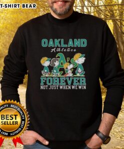 Alt Text: Cute Snoopy and Charlie Brown on an Oakland Athletics baseball sweatshirt saying Forever, Not Just When We Win.