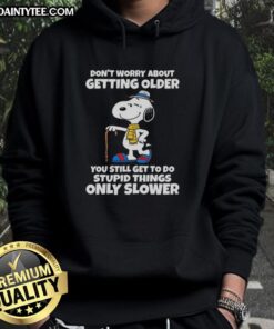 Cute Snoopy hoodie with 'Don't worry about getting older, you're still allowed to do stupid things, only slower' quote.