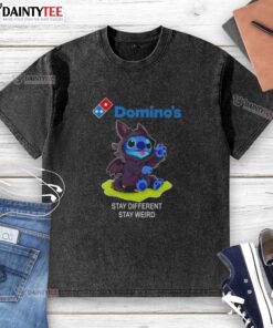 Cute Stitch cosplay wearing a Toothless X Domino's t-shirt, promoting 'Stay Different Stay Weird' slogan.