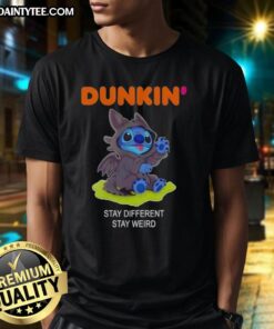 Adorable Stitch cosplay wearing 'Stay Different Stay Weird' Dunkin T-shirt featuring Toothless design.