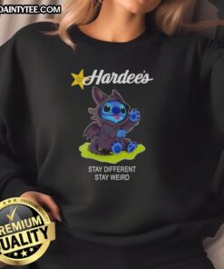 Cute Stitch cosplay wearing a Toothless x Hardee's 'Stay Different, Stay Weird' sweatshirt, showcasing fun character style.