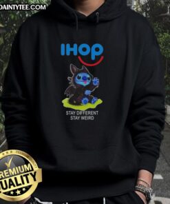 Cute Stitch cosplay wearing a Toothless hoodie with 'Stay Different Stay Weird' slogan for unique style.