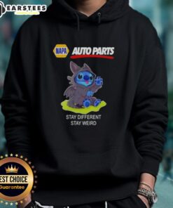 Alt Text: Cute Stitch cosplay wearing a Toothless X Napa Auto Parts hoodie with Stay Different, Stay Weird slogan.