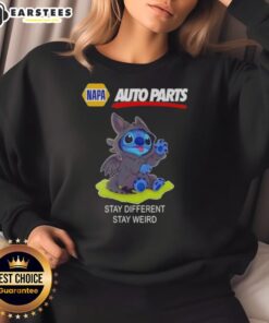 Alt Text: Cute Stitch cosplay wearing a Toothless sweatshirt from Napa Auto Parts, promoting Stay Different, Stay Weird style.