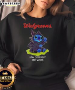 Alt Text: Cute Stitch Cosplay with Toothless design on a Stay Different Stay Weird sweatshirt from Walgreens.