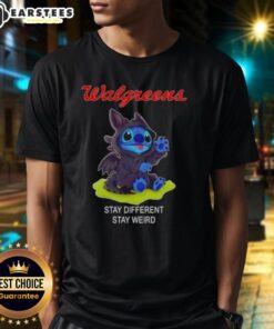 Adorable Stitch cosplay wearing a Toothless X Walgreens Stay Different Stay Weird T-shirt, showcasing unique style and creativity.