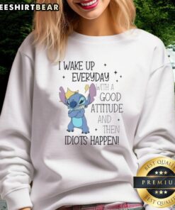 Alt Text: Cute Stitch sweatshirt featuring the quote I wake up everyday with a good attitude and then idiots happen.
