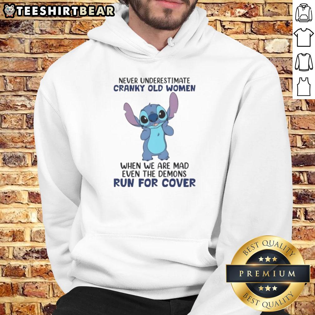 cute-stitch-never-underestimate-cranky-old-women-when-we-are-mad-even-the-demons-run-for-cover-hoodie Cute Stitch hoodie featuring 'Never Underestimate Cranky Old Women' design, perfect for showcasing fierce style.