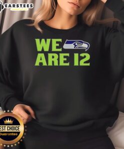 Adorable 'We Are 12' Seattle Seahawks sweatshirt showcasing team spirit and cozy style for fans.
