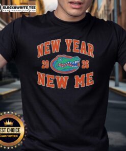 Alt Text: Official Florida Gators Football New Year New Me 2026 Logo T-Shirt featuring vibrant team colors and logo design.