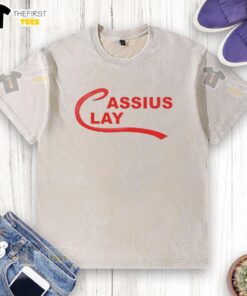 Funny Cassius Clay Muhammad Ali washed t-shirt design featuring a humorous graphic of the boxing legend.
