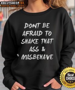 Funny 'Don't Be Afraid To Shake That Ass And Misbehave' sweatshirt in vibrant colors, perfect for casual wear.
