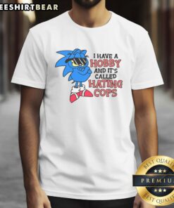 Alt Text: Funny 'I Have A Hobby Called Hating Cops' Garfield Sonic T-Shirt design featuring cartoon graphics and bold text.