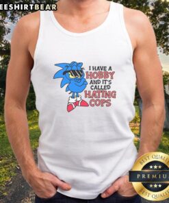 Garfield and Sonic graphic tank top featuring the humorous phrase 'I Have A Hobby Called Hating Cops' in vibrant colors.