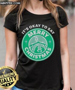 Alt Text: Funny 'It's Okay to Say Merry Christmas' logo on a ladies' tee shirt, perfect for festive holiday celebrations.
