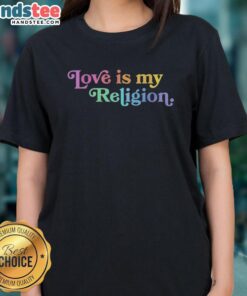 Funny John Pavlovitz wearing 'Patriot Love Is My Religion' ladies tee, showcasing a humorous and vibrant style.