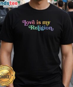Funny John Pavlovitz wearing a Patriot Love Is My Religion t-shirt, showcasing humor and a message of love and unity.