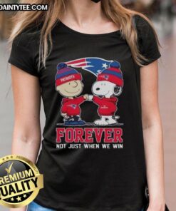 Funny New England Patriots x Charlie Brown vs Snoopy graphic on a ladies tee, celebrating team spirit and humor.