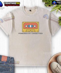 Funny Powered By Cassettes washed t-shirt featuring a retro cassette tape graphic, perfect for music lovers and nostalgia fans.