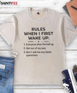 Funny rules for waking up on a washed t-shirt, featuring humorous graphics and playful text for a lighthearted morning vibe.