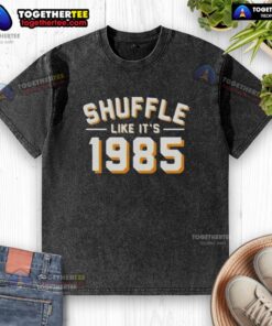 Funny Shuffle Like It's 1985 washed t-shirt featuring retro graphics and vibrant colors for a playful vintage style.