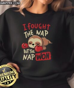 Funny sloth boxing in a sweatshirt with 'I fought the nap but the nap won' text, perfect for nap lovers.