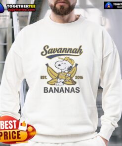 Alt Text: Funny Snoopy lying on a banana, wearing a Savannah Bananas outfit, showcasing a playful sweatshirt from 2016.