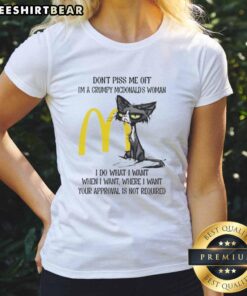 Alt Text: Grumpy cat wearing a McDonald's themed shirt, showcasing a funny and tired expression, perfect for a humorous tee.