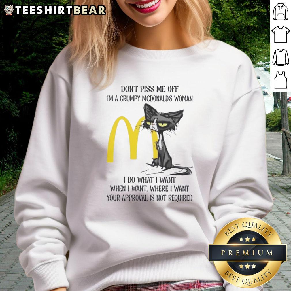 funny-tired-cat-dont-piss-me-off-im-a-grumpy-mcdonalds-woman-i-do-what-i-want-sweatshirt Funny tired cat with grumpy expression wearing a McDonald's sweatshirt saying 'I do what I want'.