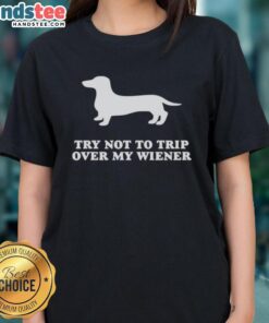Funny Try Not To Trip Over My Wiener Ladies Tee featuring a playful dog graphic on a stylish women's t-shirt.