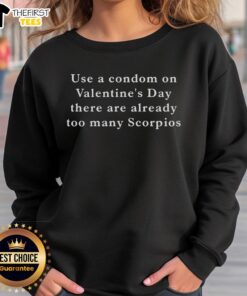 Funny Use a Condom on Valentine's Day sweatshirt with text about Scorpios, perfect for humorous Valentine's gifts.