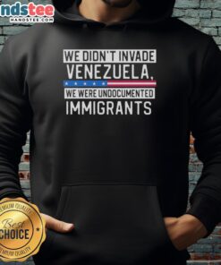 Funny hoodie featuring 'We Didn't Invade Venezuela, We Were Undocumented Immigrants' design, perfect for casual wear.