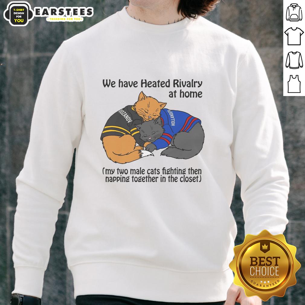 funny-we-have-heated-rivalry-at-home-my-two-male-cats-fighting-then-napping-together-in-the-closet-sweatshirt Alt Text: Two male cats playfully fighting and then napping together in a closet, showcasing their funny rivalry at home.