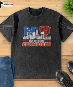 Alt Text: Good 2025 NFC North Champions Chicago Bears washed t-shirt featuring city skyline and player names design.
