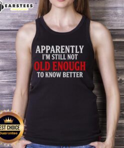 Trendy 'Good Apparently Im Still Not Old Enough To Know Better' tank top on a model, perfect for casual summer wear.